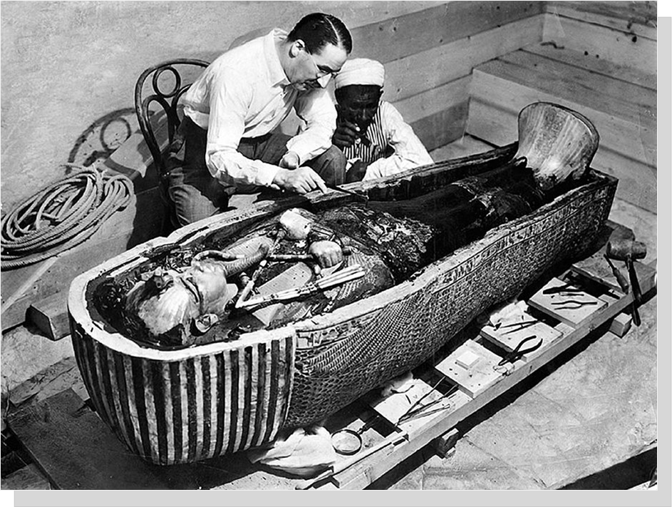 Howard Carter examining the innermost coffin of Tutankhamun